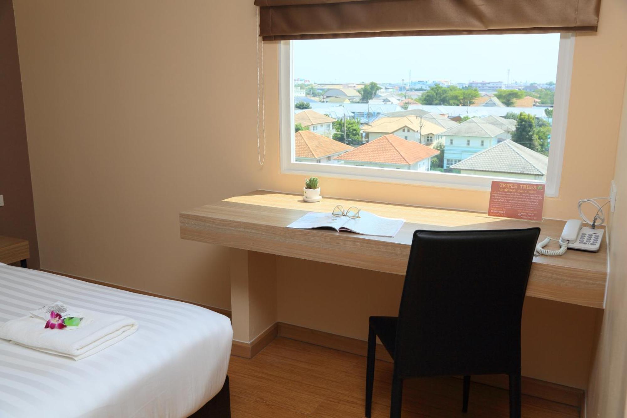 Triple Trees Hotel Патум Тани Екстериор снимка